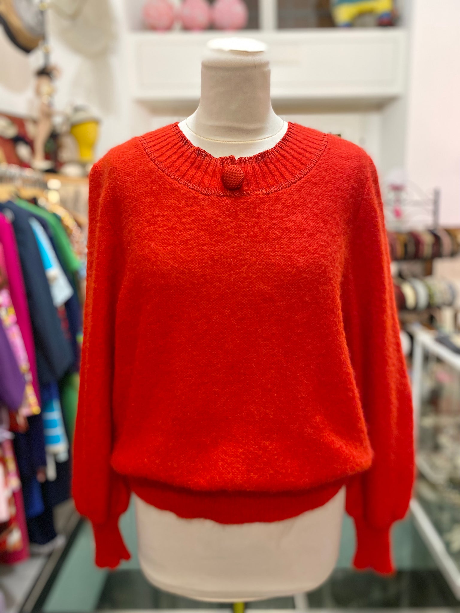 Maglione rosso bottone