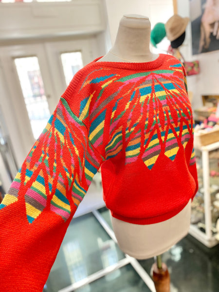 Maglione 80s rosso e arcobaleno