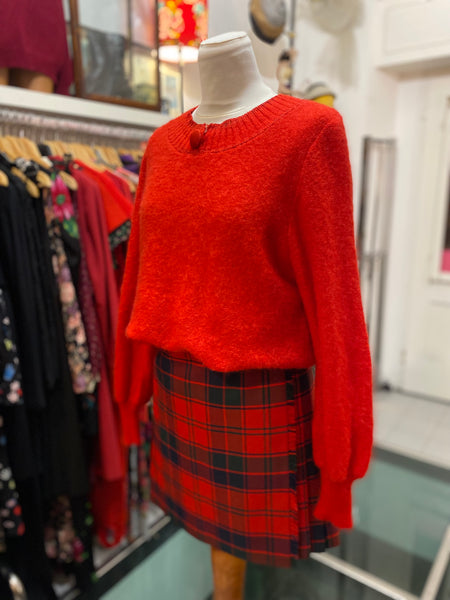 Maglione rosso bottone