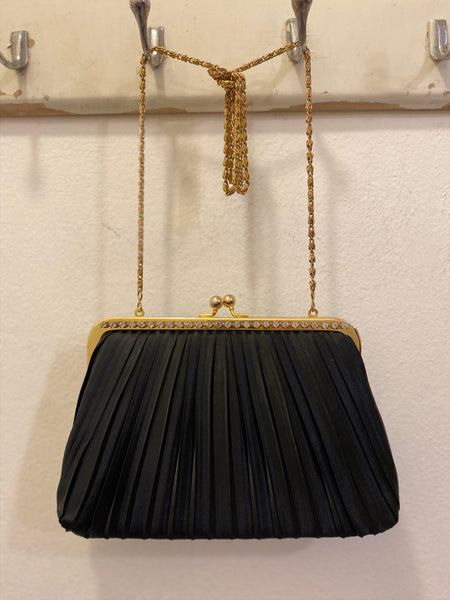 Borsetta tessuto plissettato