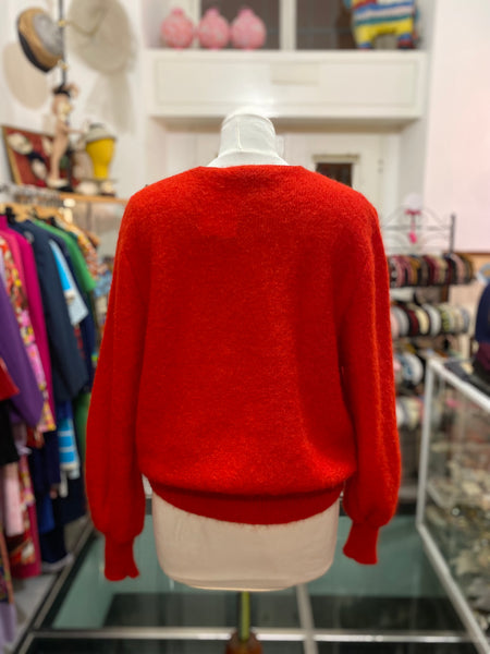 Maglione rosso bottone