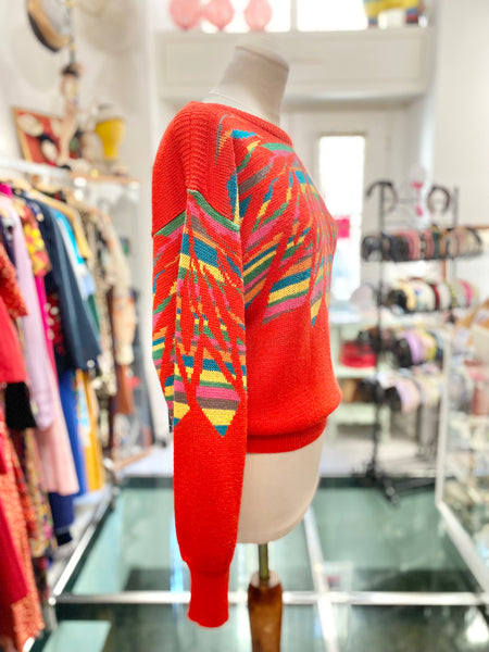 Maglione 80s rosso e arcobaleno