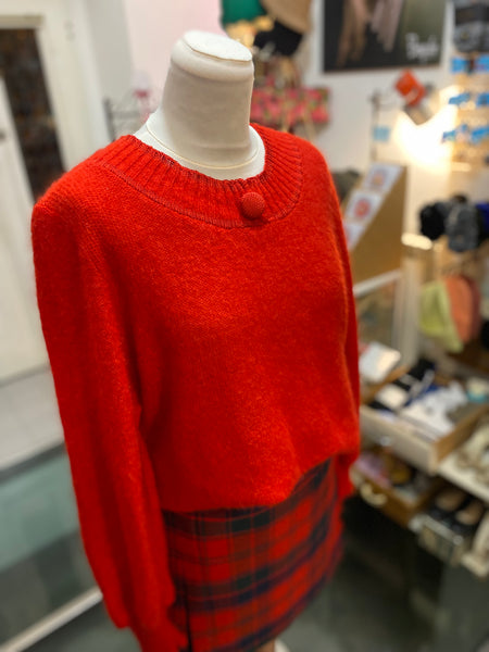 Maglione rosso bottone