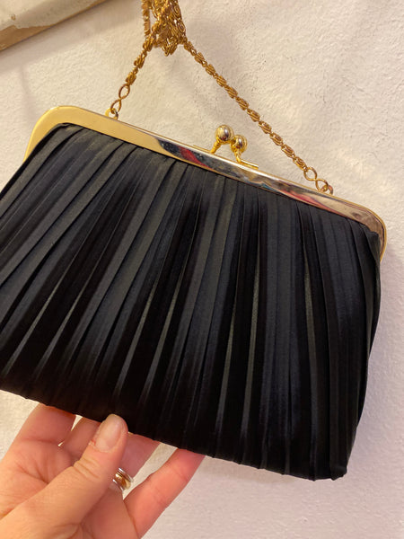 Borsetta tessuto plissettato