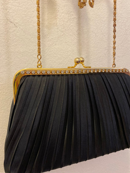 Borsetta tessuto plissettato