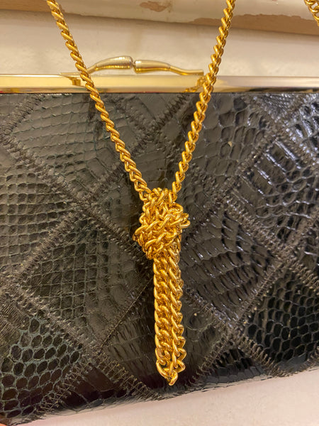 Borsetta patchwork rettile